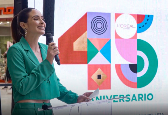 woman at a podium speaking at an event