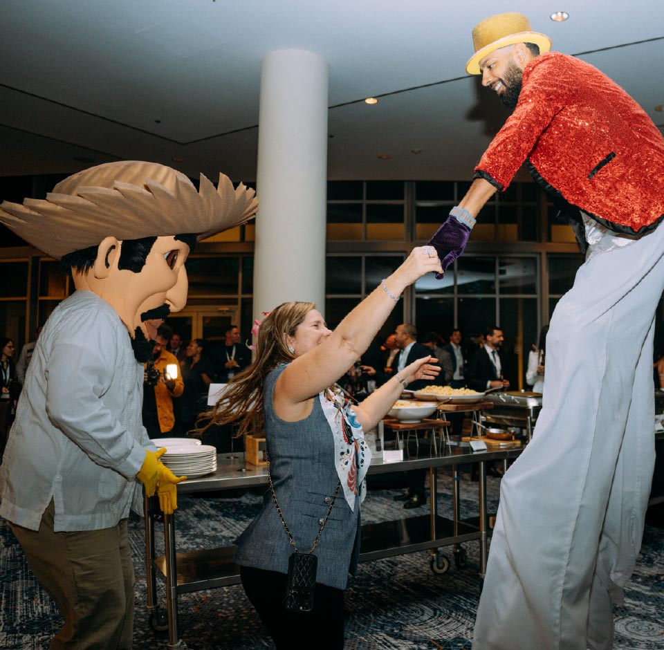 a photo of one of the attendees dancing with the post event entertainment