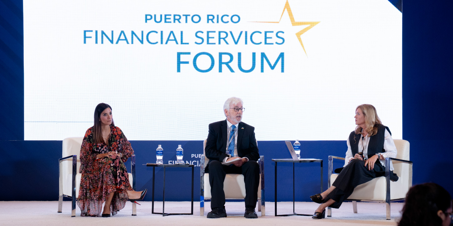 a photo of speakers on stage